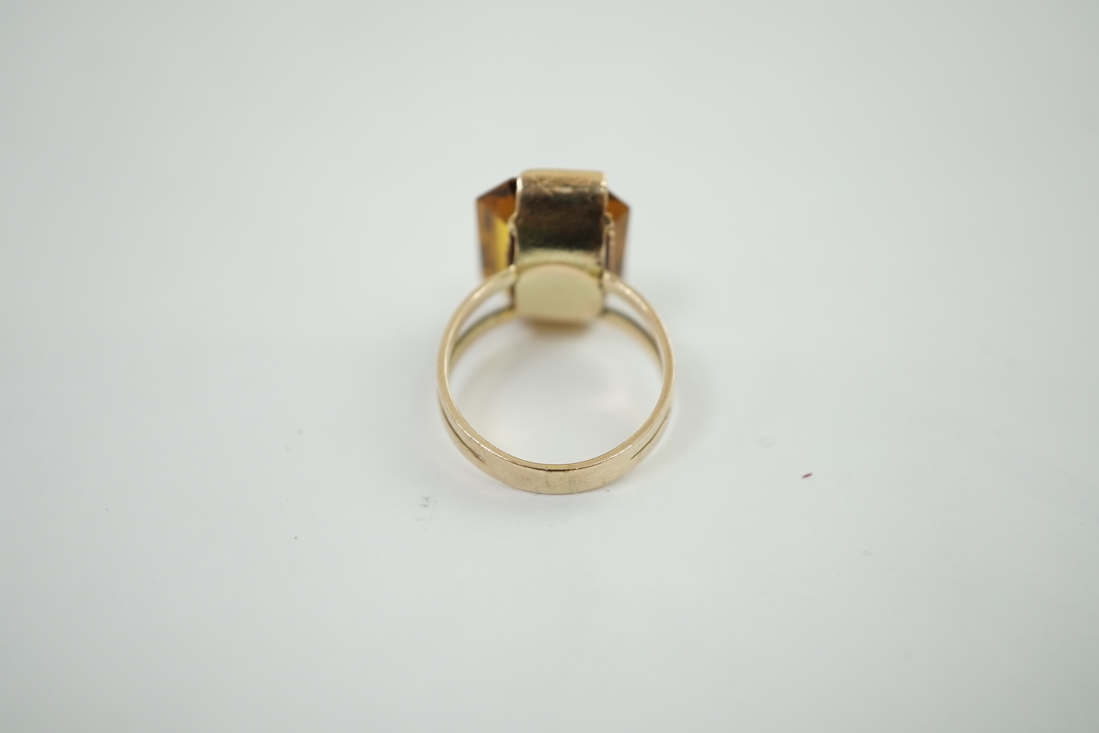 A mid to late 20th century gold and single stone octagonal cut synthetic? sapphire set dress ring